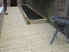 Pine decking and plant bed 